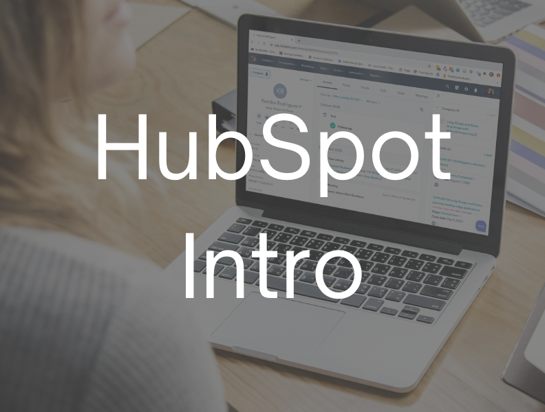 White Text: HubSpot Intro Background: Person sitting at laptop